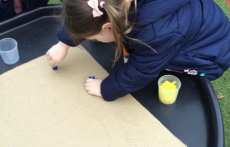nursery children outside doing activities nursery children outside doing activities